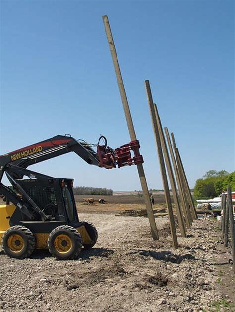 setting 646 square post with skid steer|skid steer pole setter.